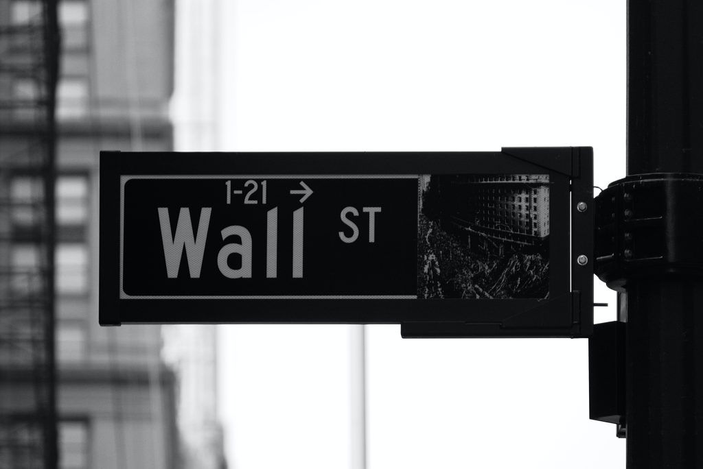 Pic shows a Wall Street sign. Credit Patrick Weissenberger, via Unsplash